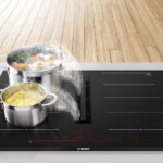 Placa con extractor integrado PXX875D67E de Bosch, dos productos en uno para tu cocina.